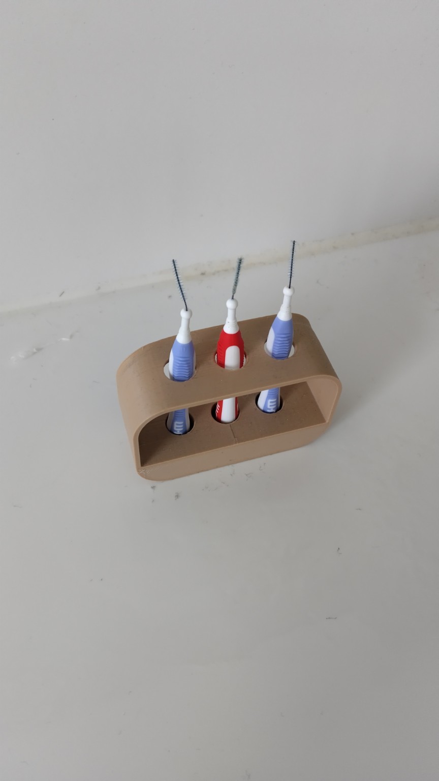 Holder for three interdental brushes